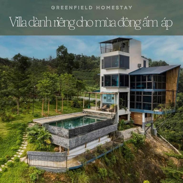 a house with a swimming pool in front of a house at Mây Villa HA in Yên Bài