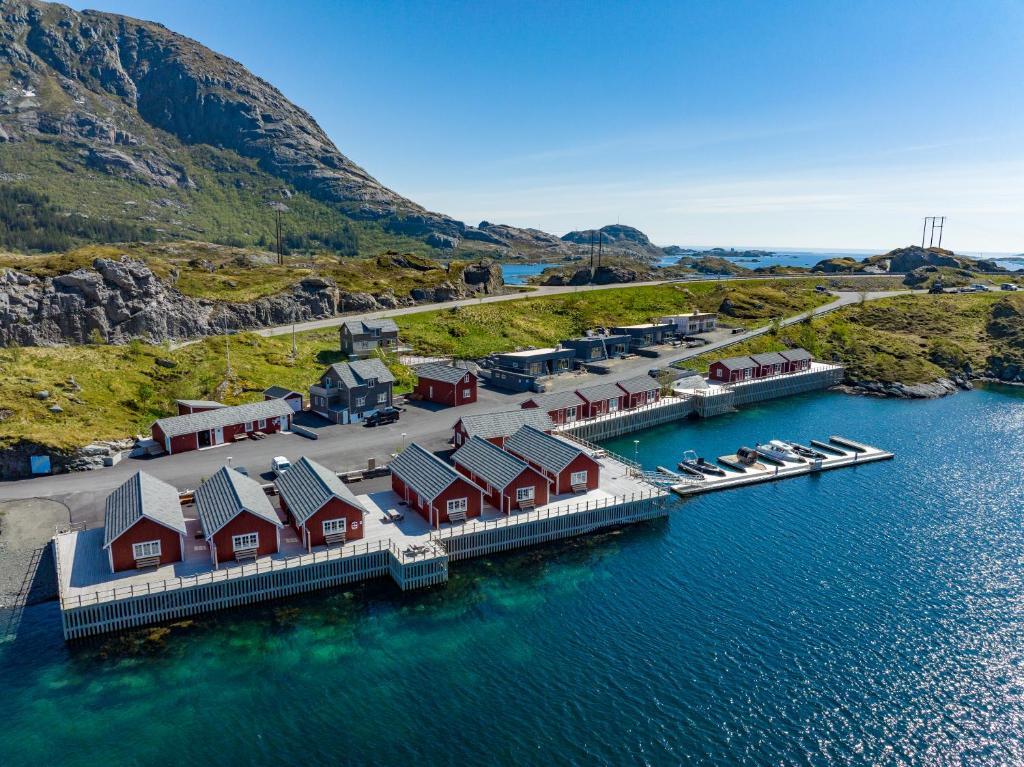 an aerial view of a harbor with red houses at ROOMS by Kåkern Bridge in Sund