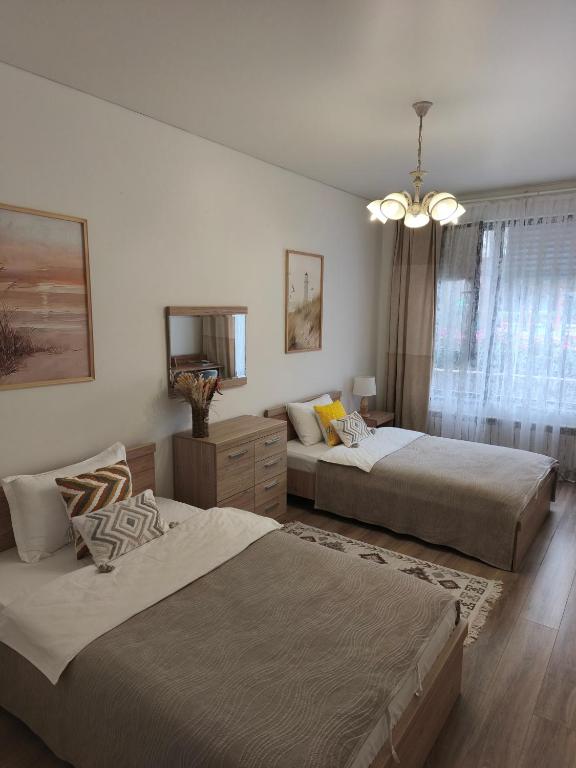 تصویر اتاق‌های Apartment near the Kazakhstan Hotel in Almaty - تصویر ۲
