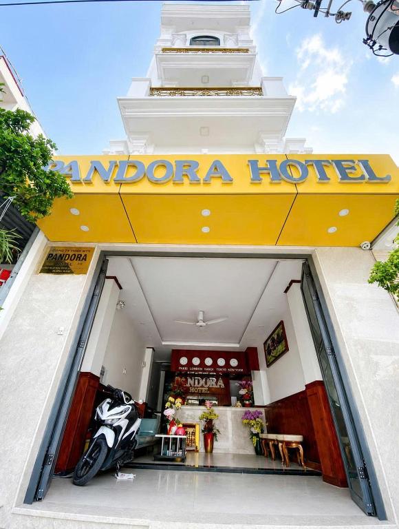 a motorcycle parked in the entrance to a hotel at Pandora Hotel Cần Thơ in Can Tho