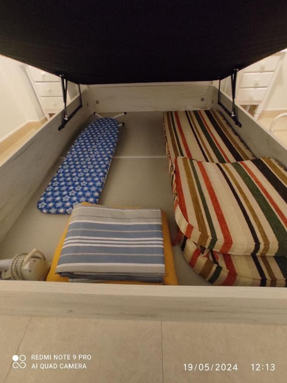 two bunk beds in a closet at Apartamento Piles playa in Piles