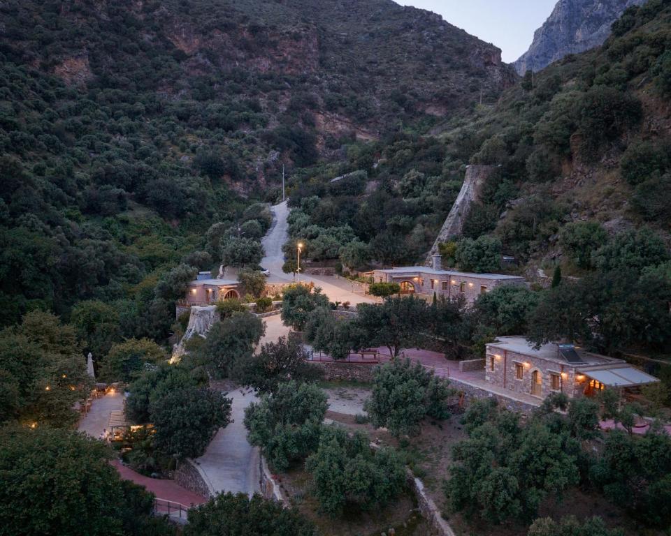 an aerial view of a town in a mountain at Manelis Mills Estate, Guest Houses & Restaurant in Plakias
