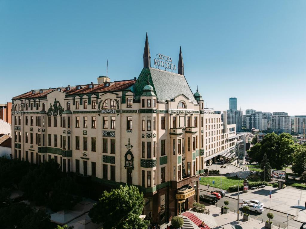 a building with a clock on the top of it at Hotel Moskva in Belgrade
