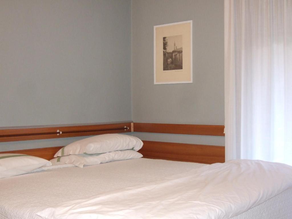 Postel nebo postele na pokoji v ubytování Hotel Canturio