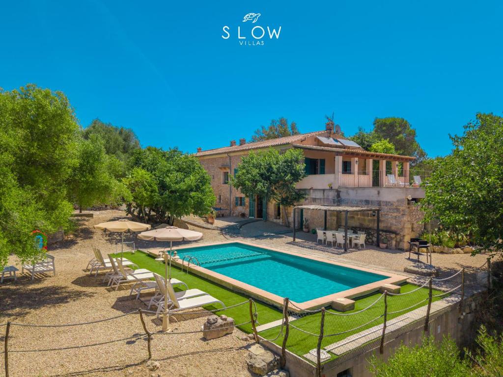 an image of a villa with a swimming pool at Villa Bandris by Slow Villas in Manacor
