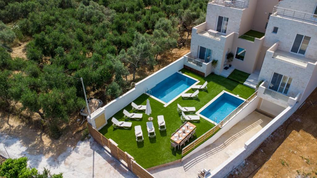 an aerial view of a villa with a swimming pool at Casa Eda in Agia Marina Nea Kydonias