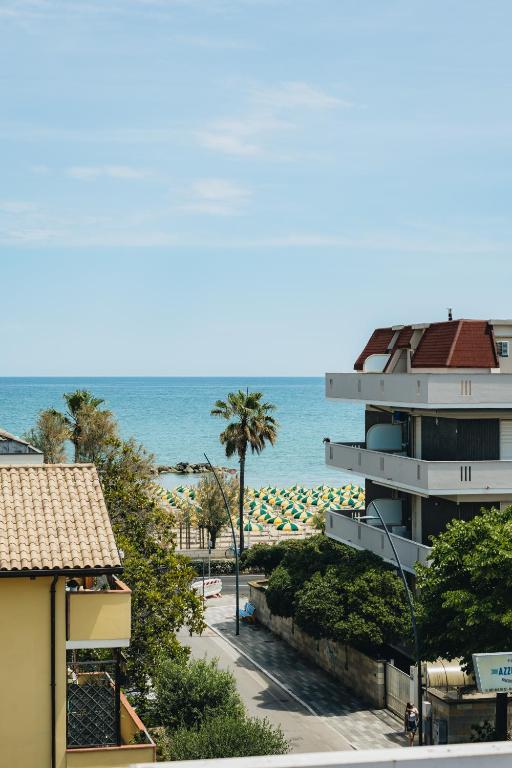 a view of the ocean from a building at Casa Anastasia Beach Loft in Montesilvano