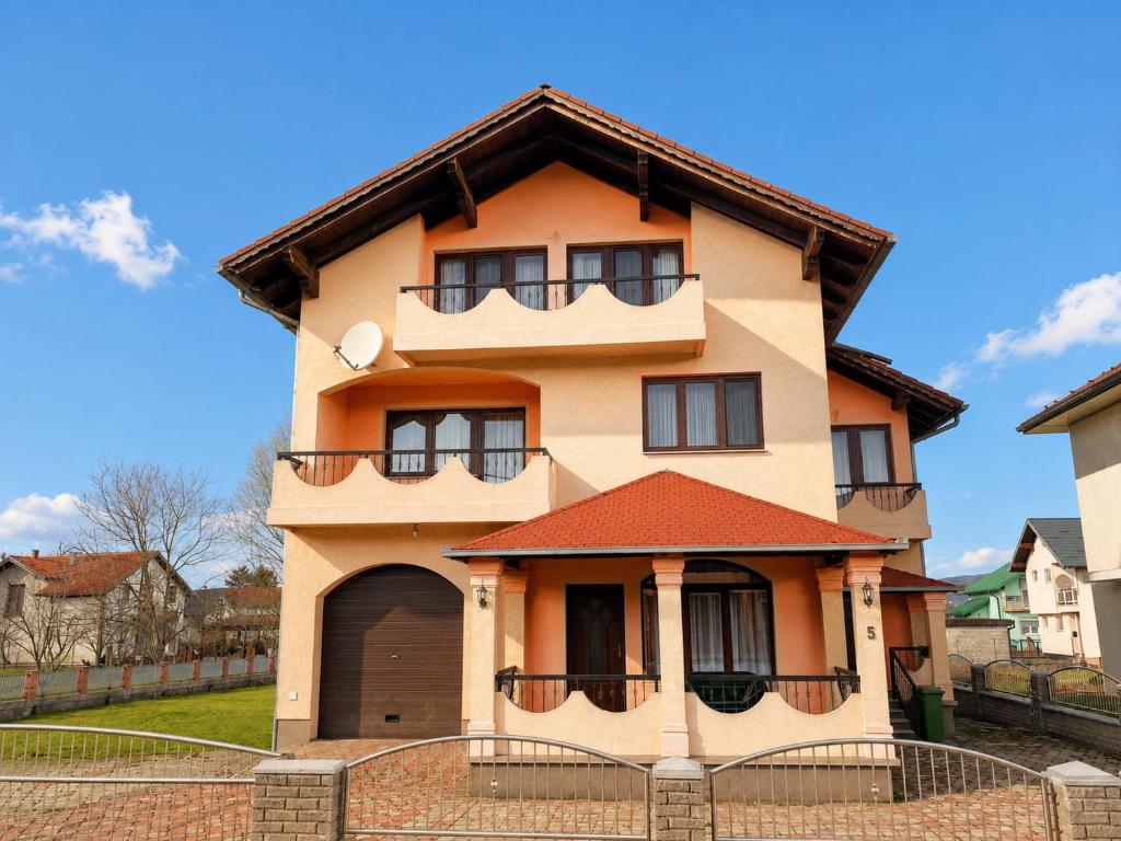 a house with a gambrel roof at Villa Lana in Bihać