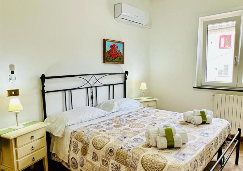 Llit o llits en una habitació de Villa Lamberti - Sea View Lamberti Apartment