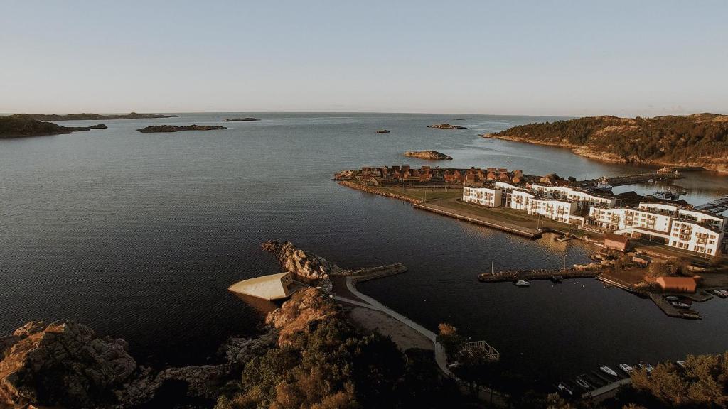 an aerial view of an island in the water at Lindesnes Havhotel in Spangereid