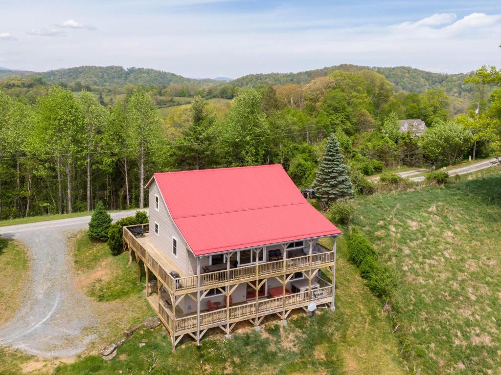 an aerial view of a house with a red roof at Rosey Outlook in Boone
