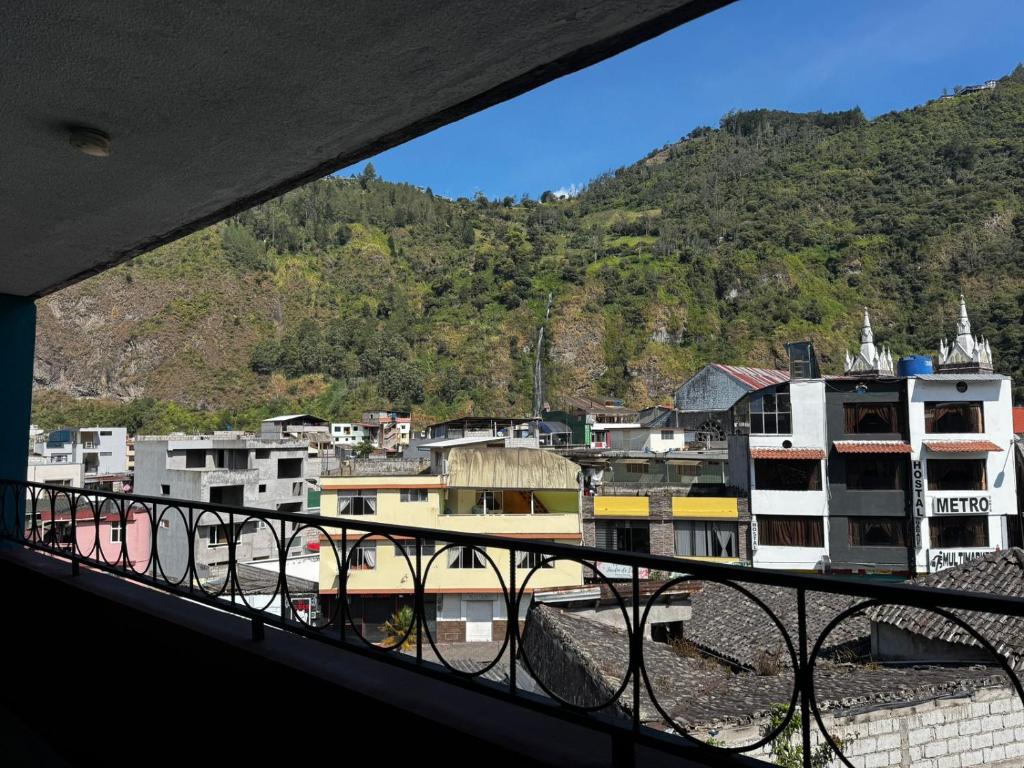 a view of a city from a balcony at Transilvania in Baños