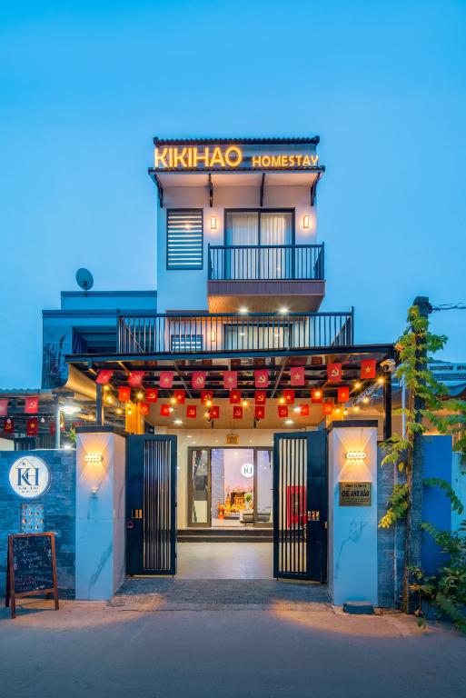 a building with a sign that reads knight hog house at Kikihao Homestay Hội An Near Tra Que Village in Hoi An