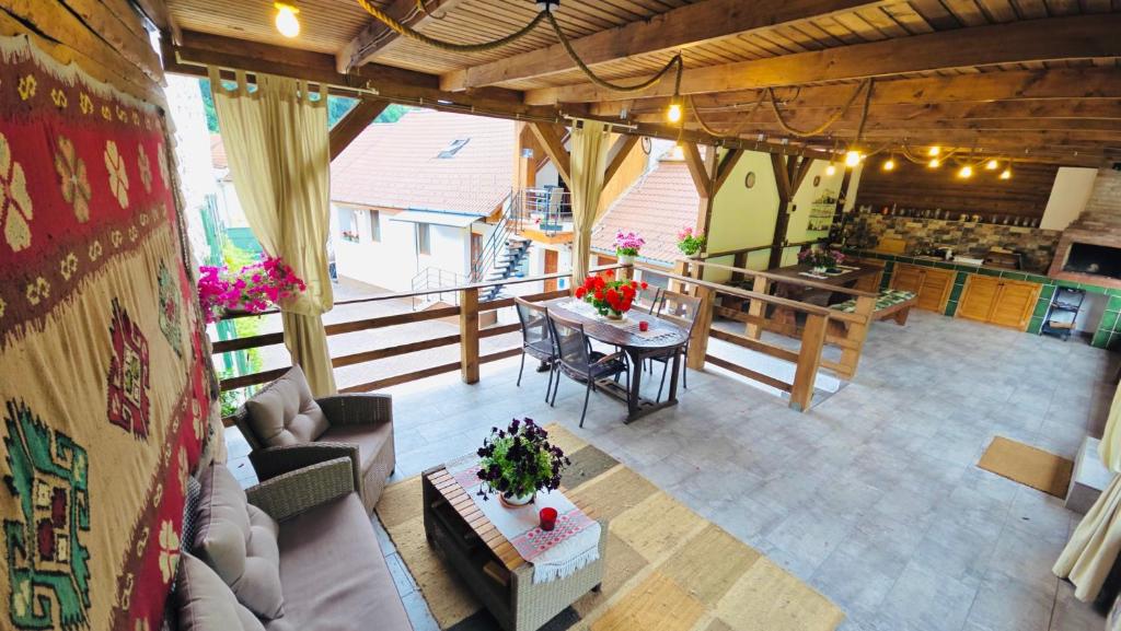 an aerial view of a living room with a table at Iosif 55 in Sighişoara