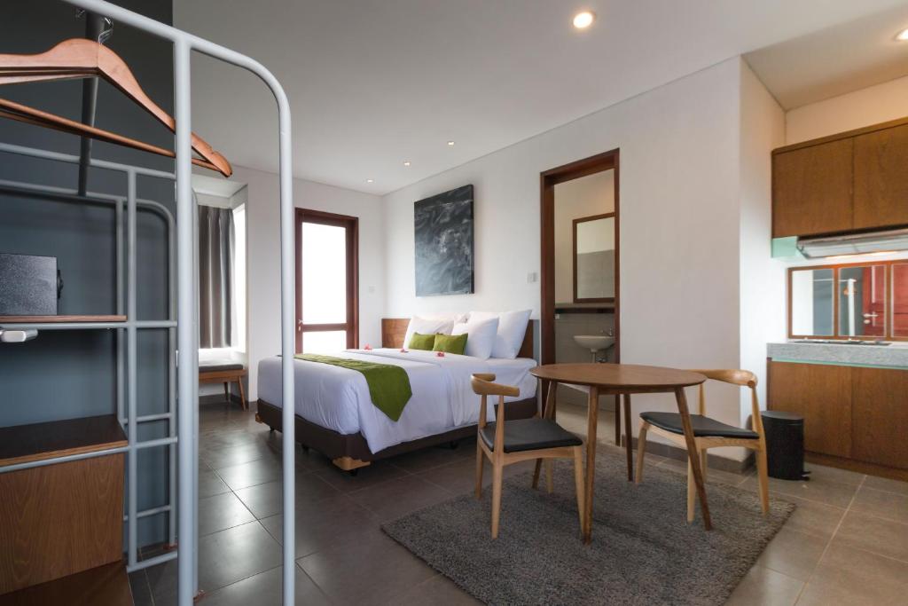 Ένα ή περισσότερα κρεβάτια σε δωμάτιο στο Sanur Art Villas