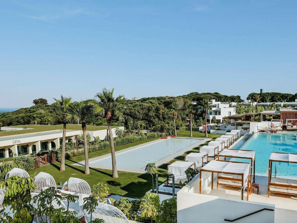 an image of the pool at the resort at SO Sotogrande Spa and Golf Resort Hotel Costa del Sol in Sotogrande