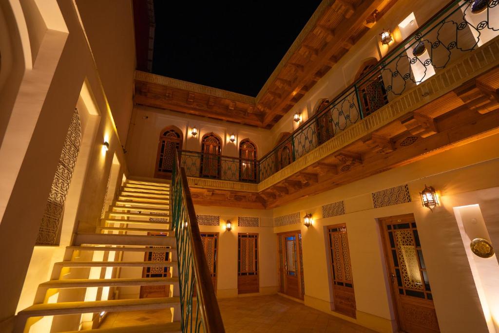 an image of a staircase in a building at Khalid Boutique in Bukhara