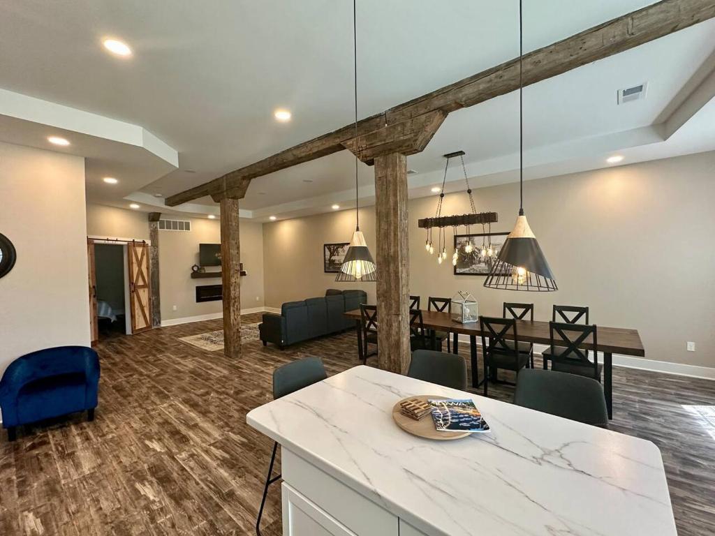 a large living room with a dining room and a kitchen at River Stone Villa - 2Bedroom/2Bath - No Step Entry in Bellevue