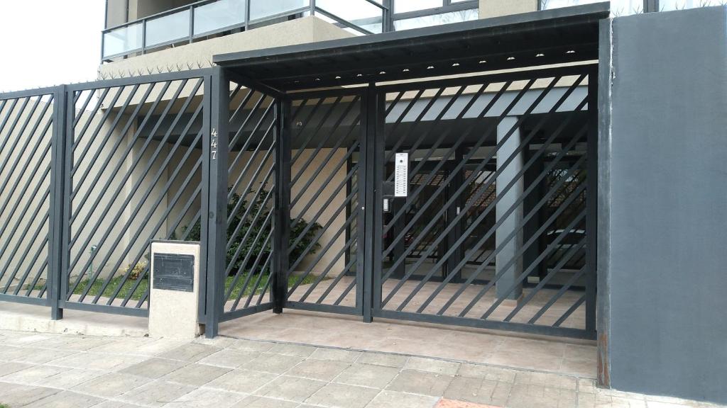 an entrance to a building with an open door at Dpto tte ibañez in Cipolletti