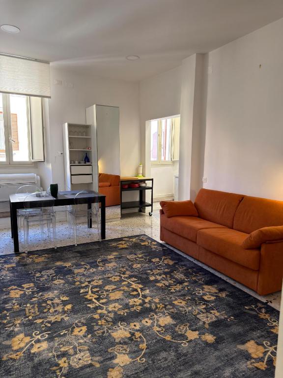 a living room with a couch and a table at La Casa di Peppe in Rieti