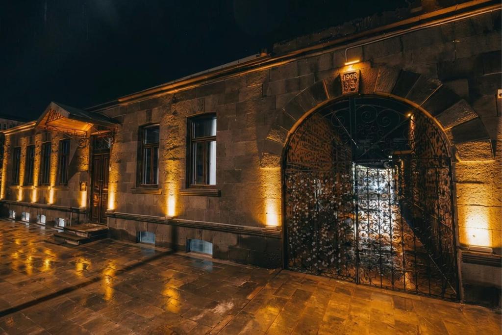 an entrance to a building with a large door at Kremlin 1908 Hotel in Kars