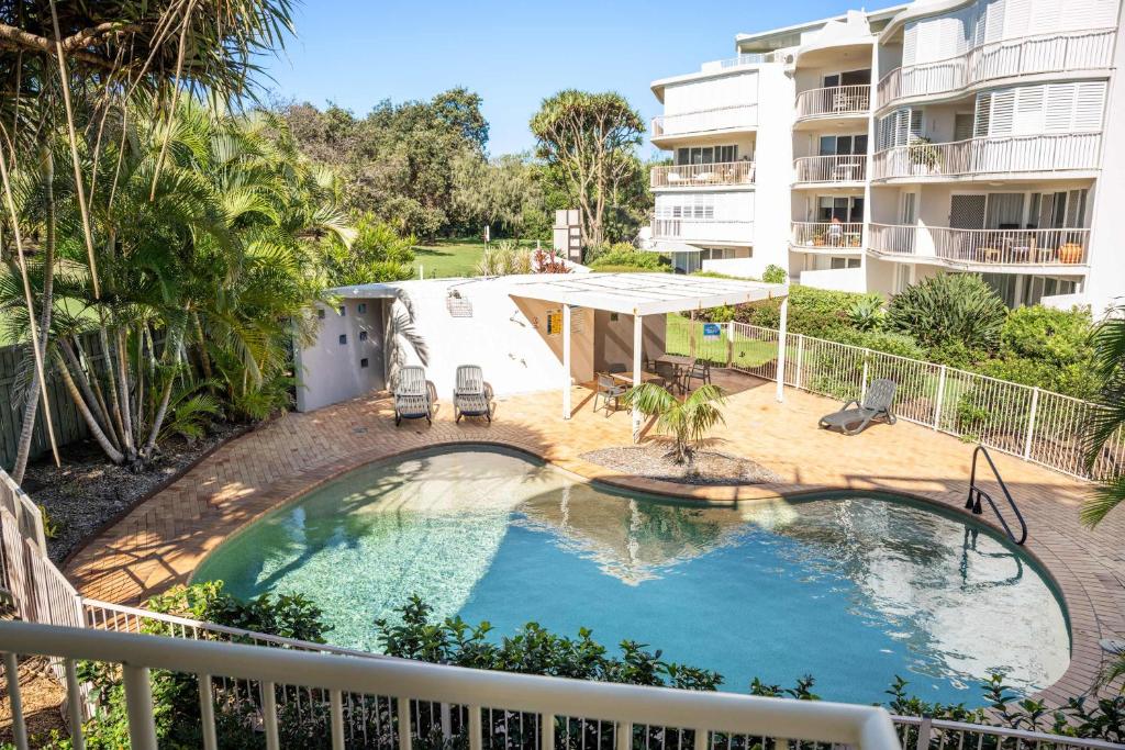 an image of a swimming pool on a balcony of a building at Surfside Buddina Beachfront 3bed Apt - Direct Beach Access in Buddina