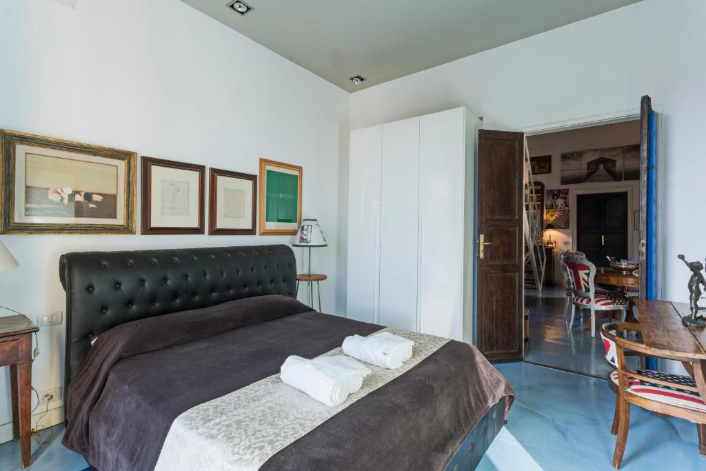 Postel nebo postele na pokoji v ubytování Loft Garibaldi
