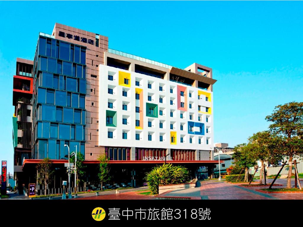 a large building with many windows on a street at In Sky Hotel in Taichung