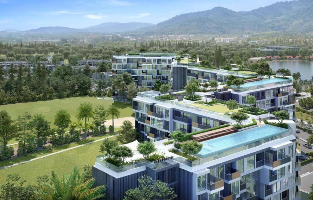 an artist impression of the proposed apartment complex at Skypark Laguna Phuket by Escape Villas in Laguna Phuket