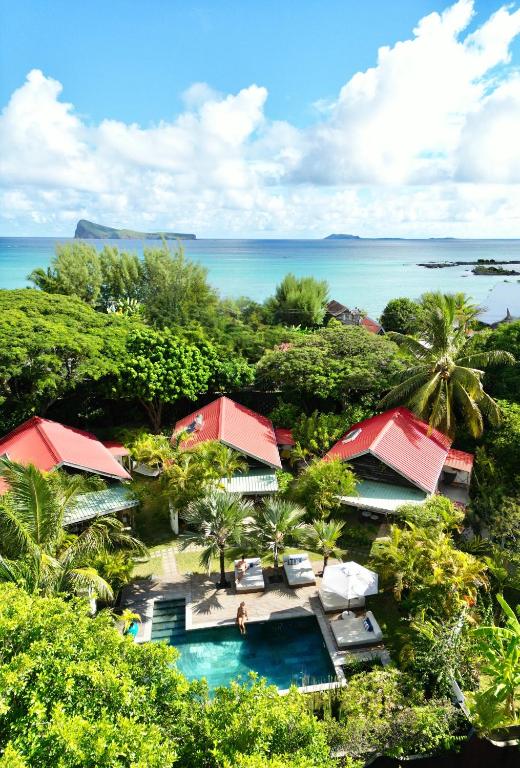 an aerial view of a resort with a swimming pool at The Good Life - Eco Lodges & Serenity Boutique Hotel - Adults Only in Cap Malheureux