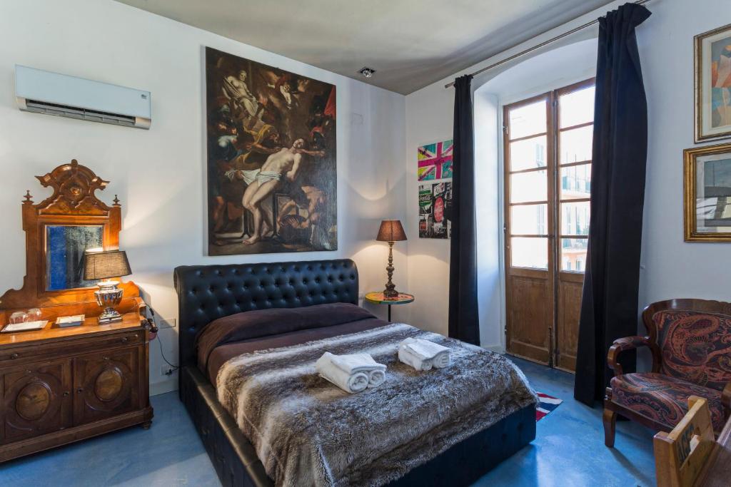 Postel nebo postele na pokoji v ubytování Loft Garibaldi