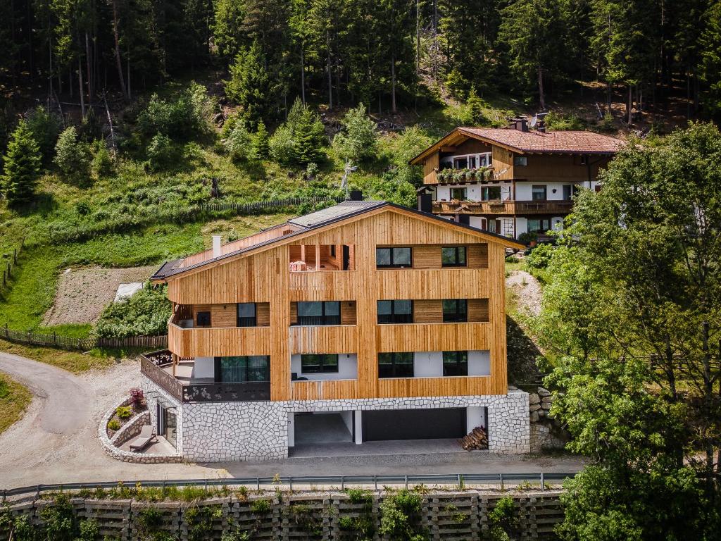 an aerial view of a building in a mountain at Chalet Esther in Longega