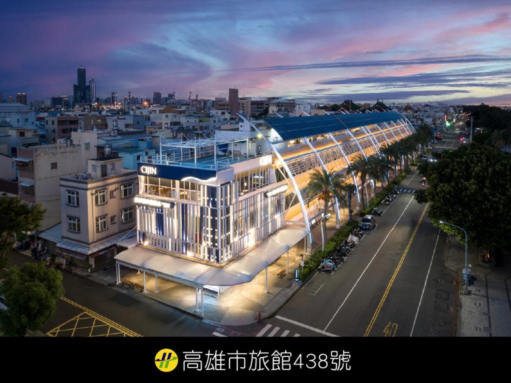 a building on a city street at night at In Young Hotel in Kaohsiung