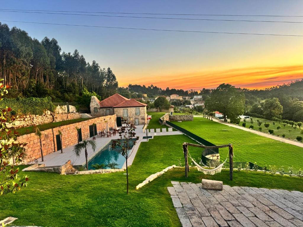 an aerial view of a house with a yard at Caza de Cima de Villa in Penafiel