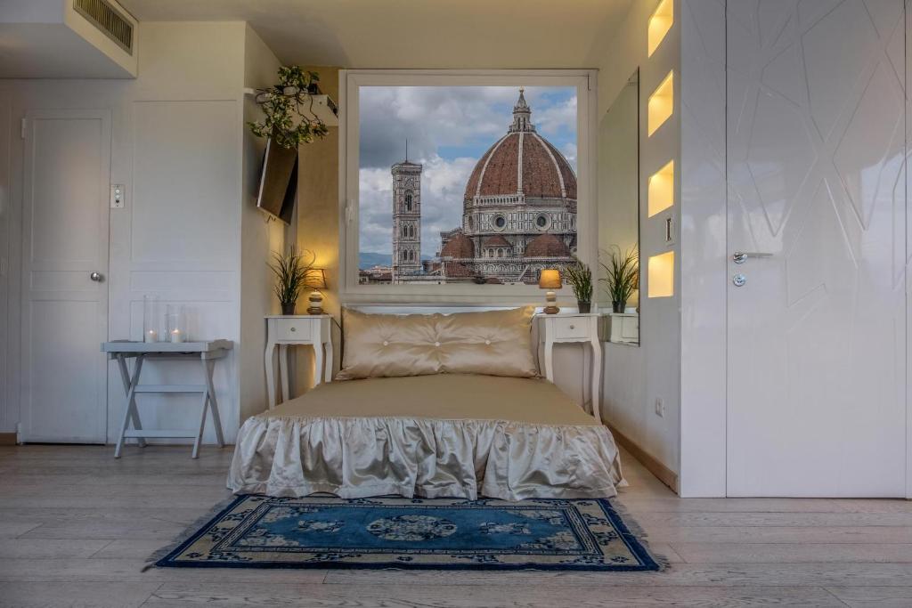 フィレンツェにあるFlorence Best Viewのベッドルーム1室(ベッド1台付)が備わります。
