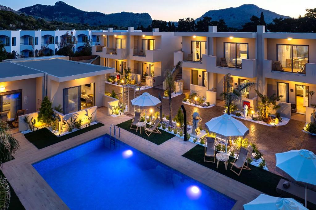 an aerial view of a villa with a swimming pool at Oasis Luxury Suites in Kolymbia