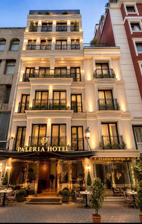 a large white building with a hotel at PALERİA hotel in Istanbul
