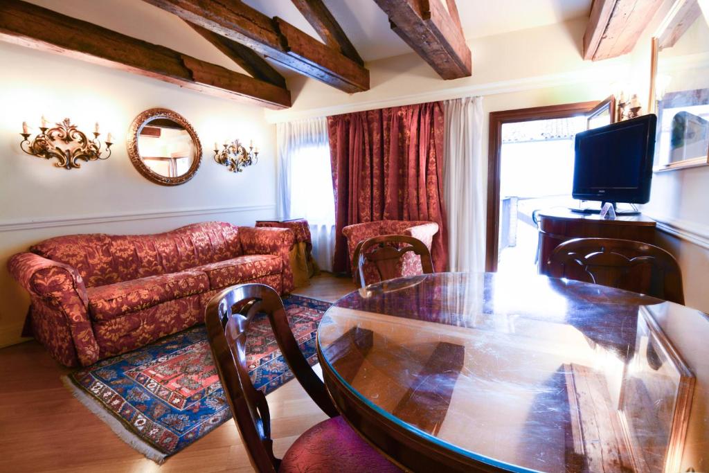 Posezení v ubytování Suites Torre Dell'Orologio