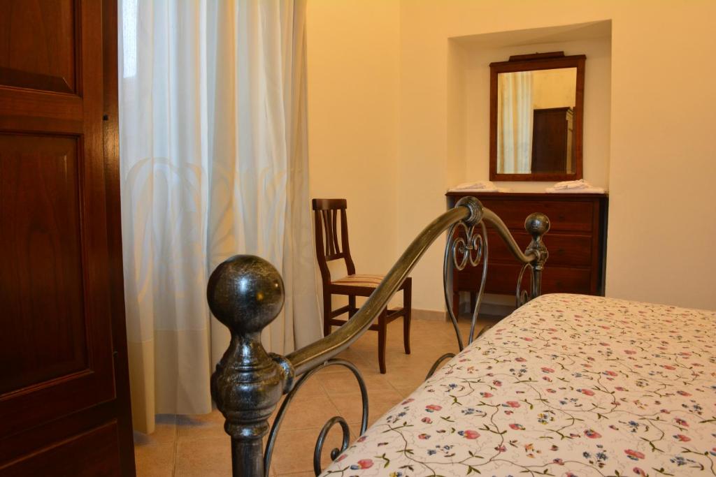 Łóżko lub łóżka w pokoju w obiekcie Villa Regina