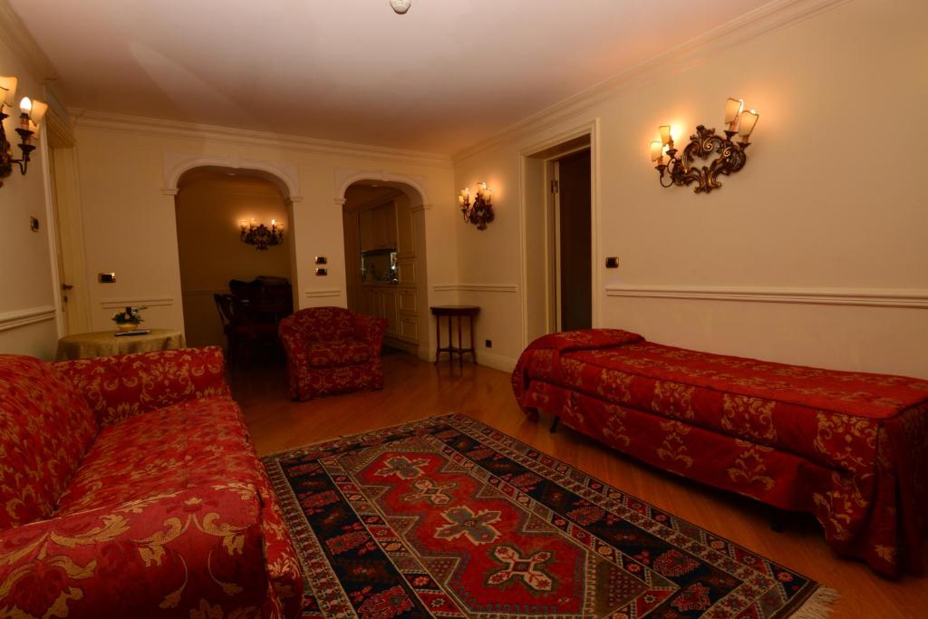 Posezení v ubytování Suites Torre Dell'Orologio