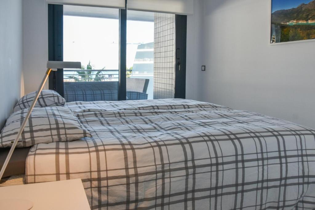 Posteľ alebo postele v izbe v ubytovaní Infinity View by Mar Holidays - Arenales del Sol