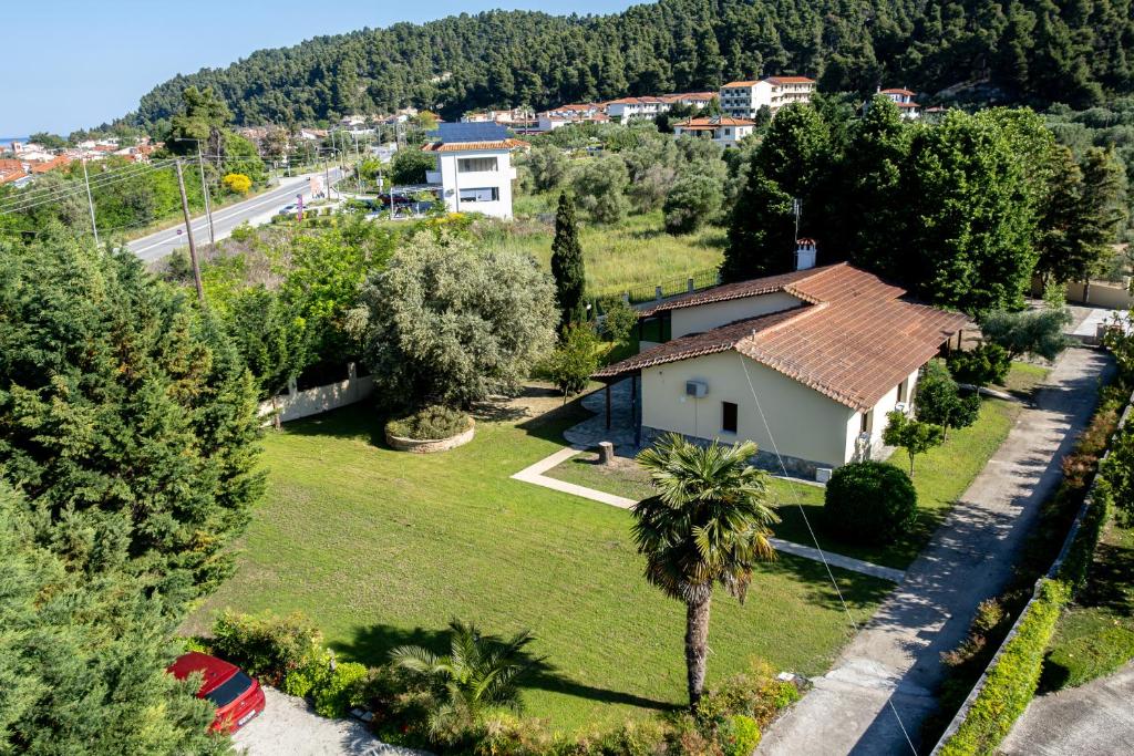 an aerial view of a house with a yard at Fourka Garden Villas in Fourka
