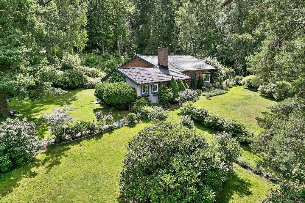 an aerial view of a house in the middle of a yard at Spacious Villa near Gothenburg in Alingsås