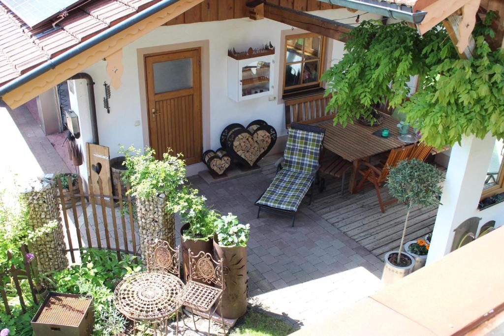 an overhead view of a patio with a table and chairs at Fewo Obermoos in Teisendorf