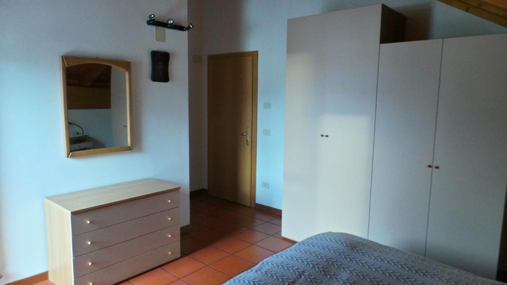 Postel nebo postele na pokoji v ubytování Appartamenti Al Ploz