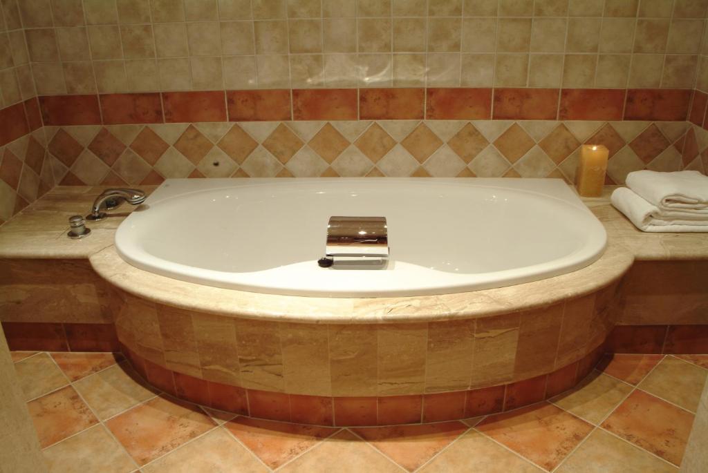 Koupelna v ubytování Hotel Maher