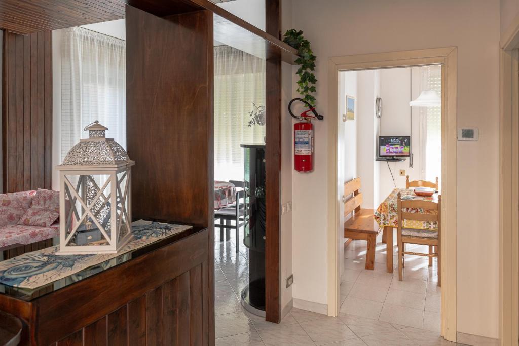 a hallway with a living room and a dining room at A Casa di Maria Sirolo in Sirolo