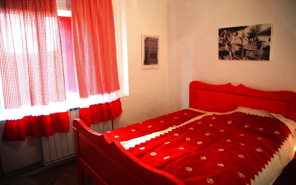 Postel nebo postele na pokoji v ubytování Etno Selo Rajski Konaci