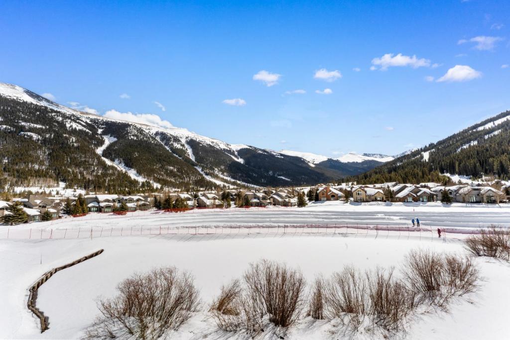 a view of a frozen lake in the mountains at Greens at Copper #314 in Copper Mountain