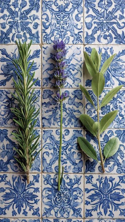 three plants on a blue and white tiled wall at Rab Barbat Villas 4 stars 300 sea in Barbat na Rabu